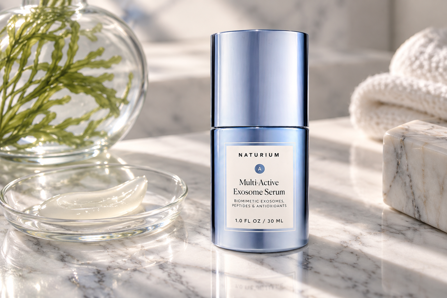 Exosomes in Skincare: What They Are, How They Work & 3 Serums to Know in 2026 Naturium Multi-Active Exosome Serum styled on a marble vanity with serum texture and botanical accents.